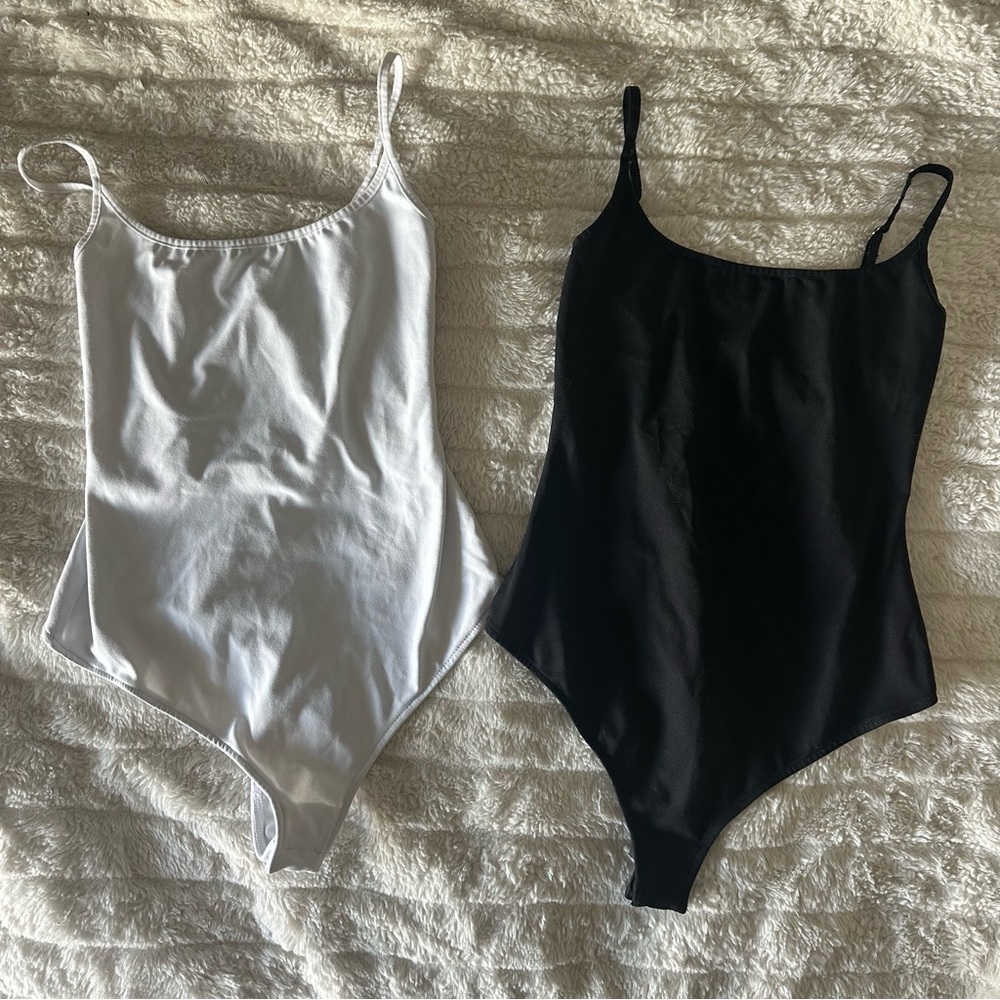 TWO free people adjustable bodysuits